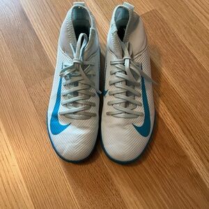 Nike Kid’s White and blue indoor soccer shoes